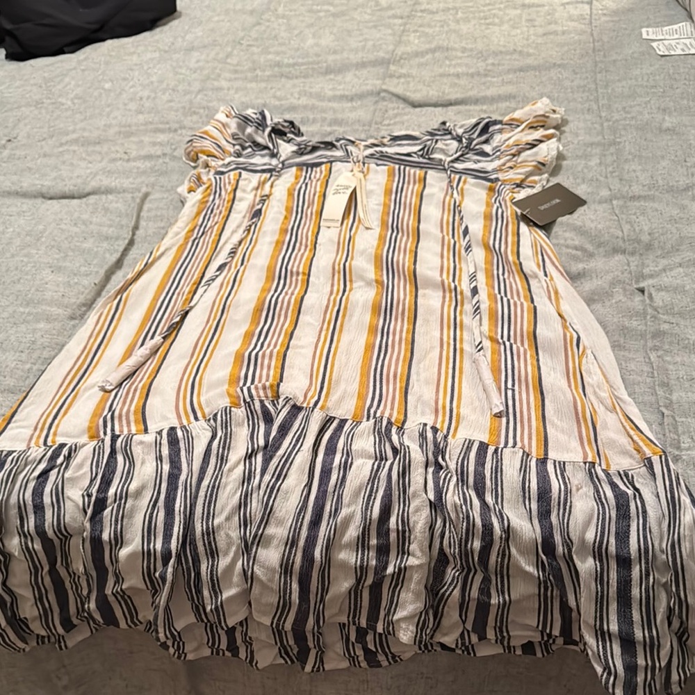 A multi striped dress in a size large by Lovestitch